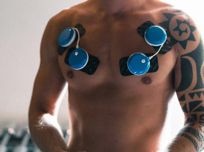 Entwickeln Sie die Brustmuskeln mit Elektrostimulation