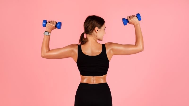 a woman who strenghtens her shoulders