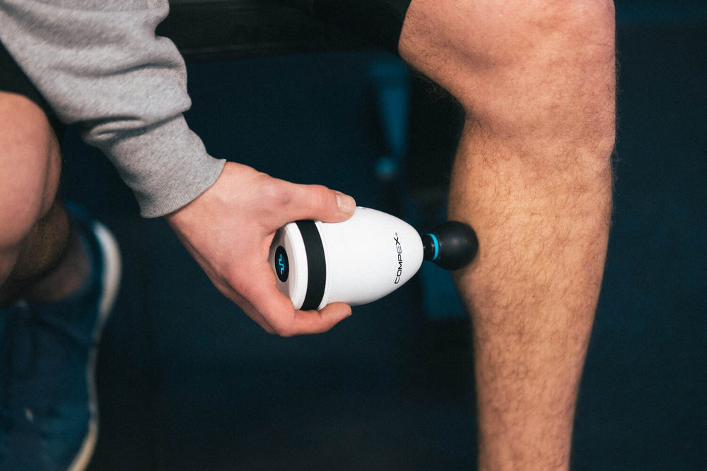 Release muscle knots with the Compex Fixx™ Mini massage gun