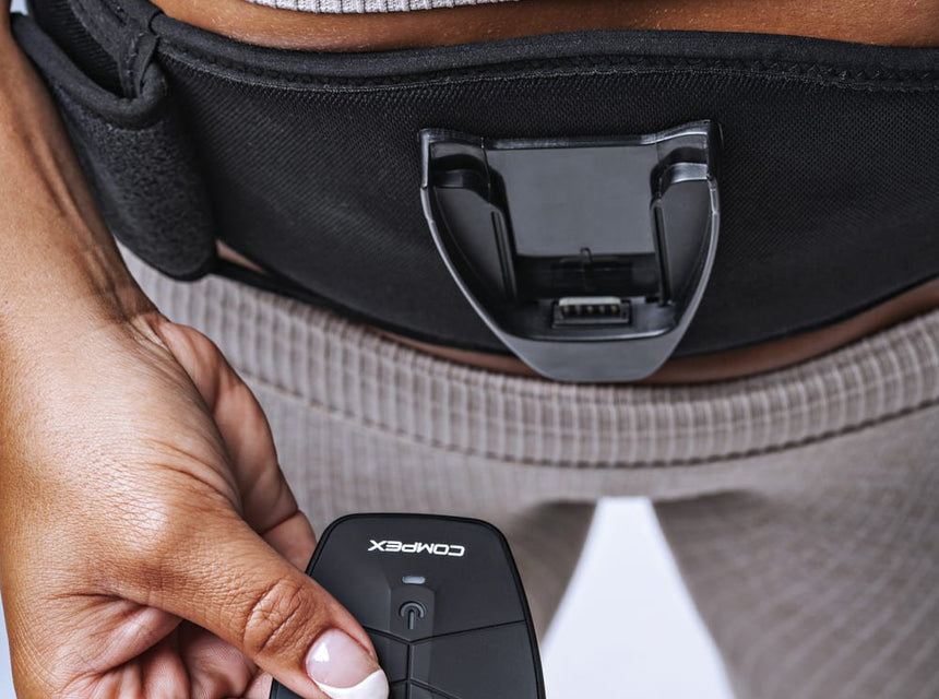 Een platte buik met de Corebelt-elektrostimulatiegordel