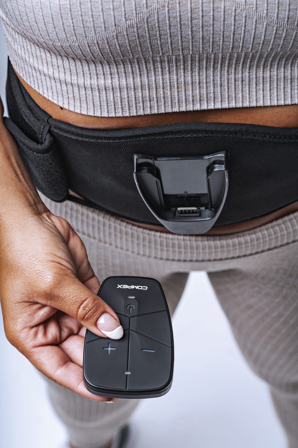 Een platte buik met de Corebelt-elektrostimulatiegordel