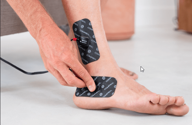 Hoe een verstuikte enkel behandelen met elektrostimulatie (EMS)