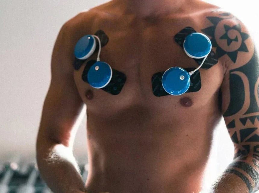 Entwickeln Sie die Brustmuskeln mit Elektrostimulation