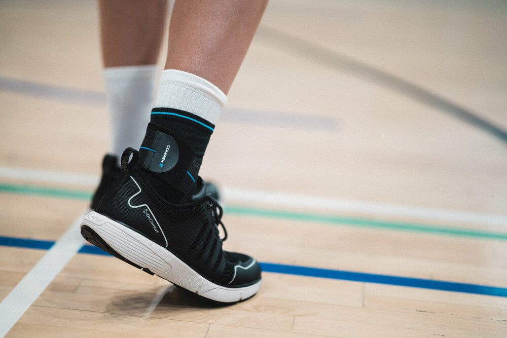 Enhance proprioception with the Compex Activ'® Ankle+ support