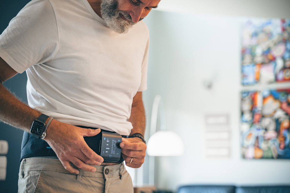 Manage your pain with thermotherapy (heat) with Compex ComfortTENS Back™