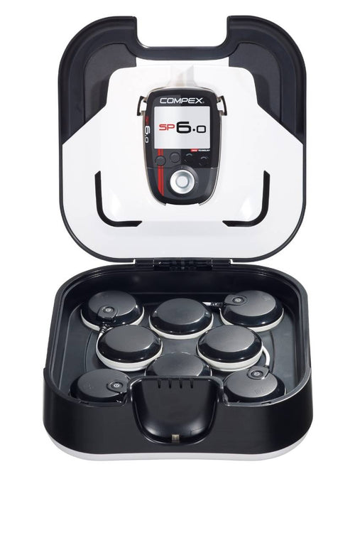 The Compex SP 6.0 EMS muscle stimulator in its docking station