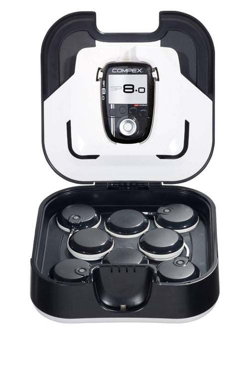 The Compex SP 8.0 EMS muscle stimulator in its docking station