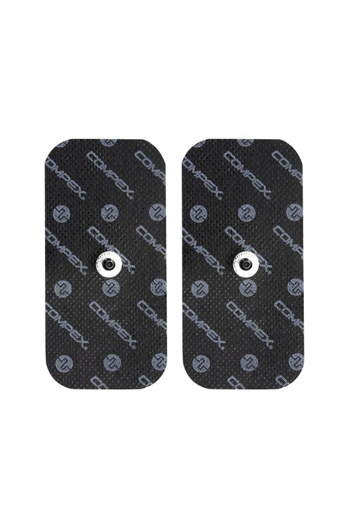 A pair of large 1-snap Compex electrodes for electrical muscle stimulation (EMS)