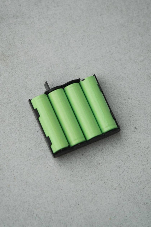A Compex EMS muscle stimulator battery (back)