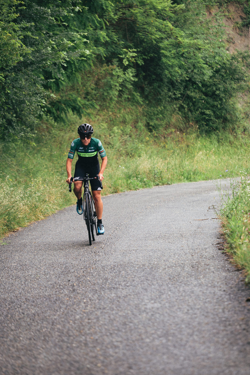 A man cycling on a road