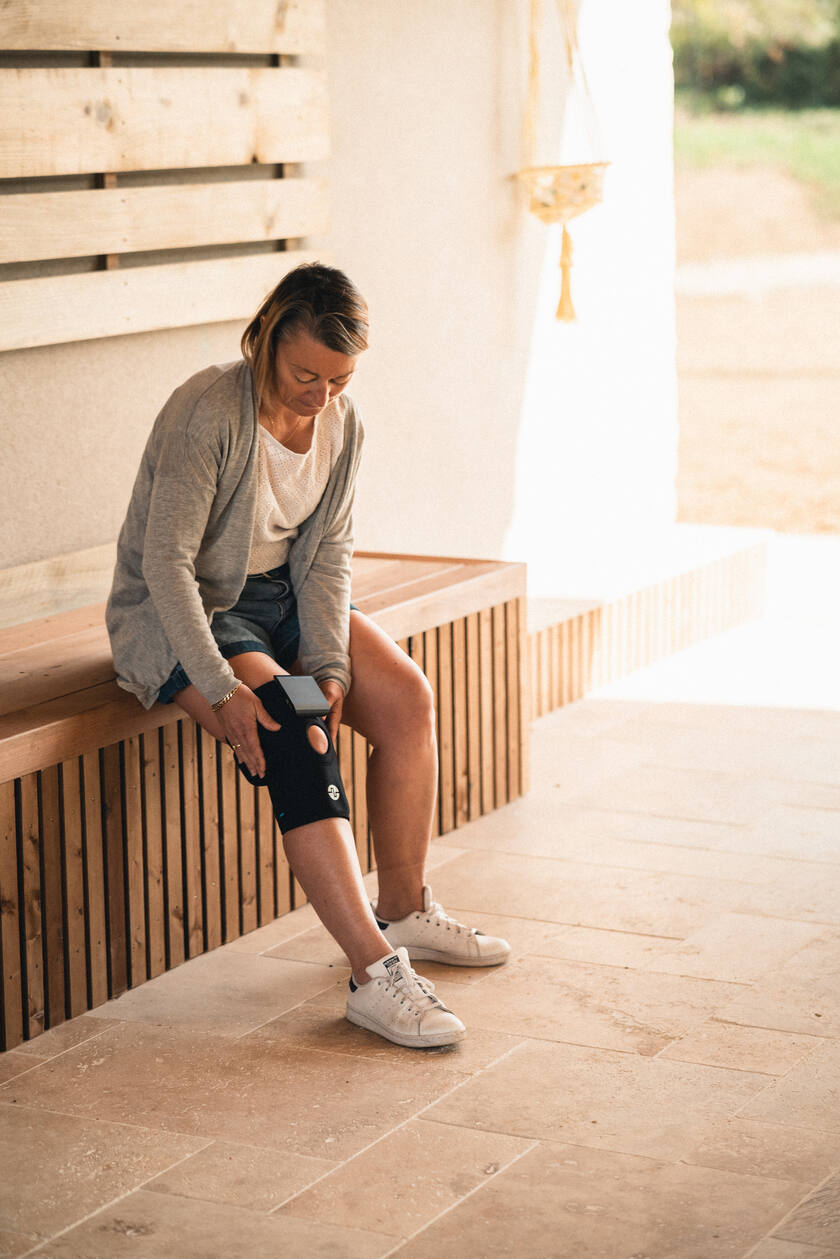 A man using the ComfortTENS Knee to releive knee pain