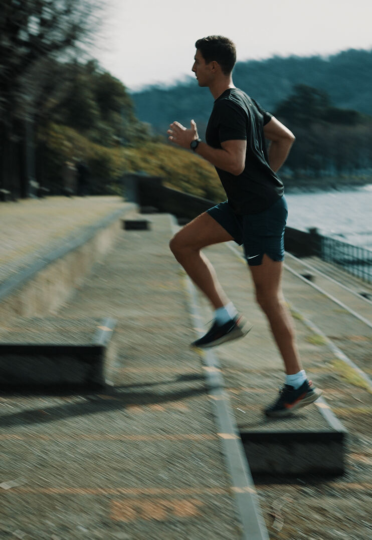 A man running up some steps