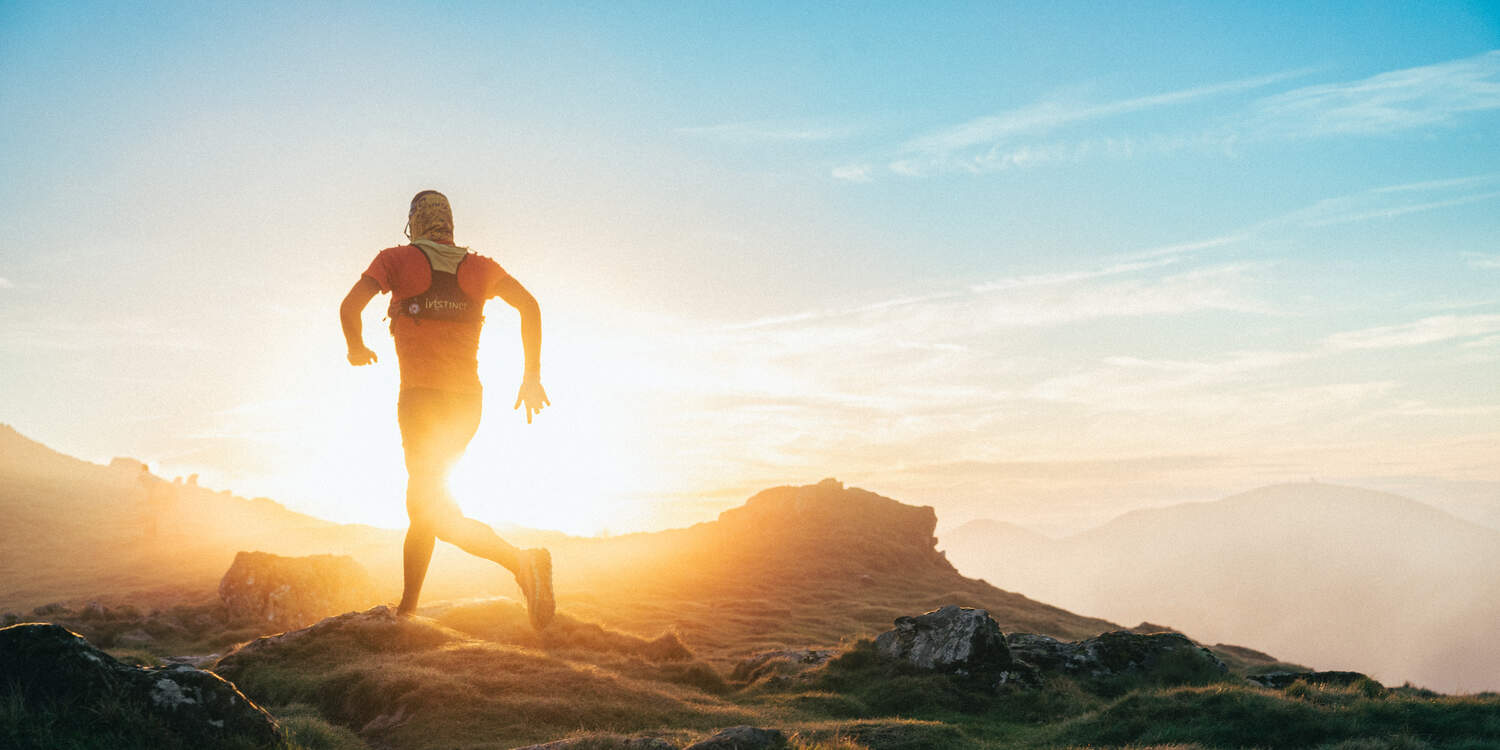 A man running on a mountain